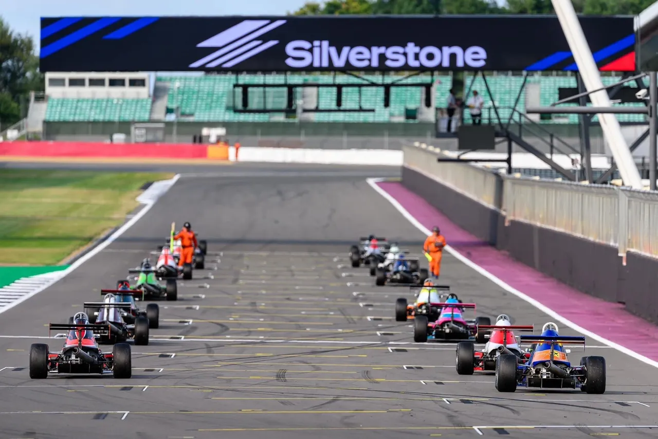 Race cars on the starting grid at Silverstone